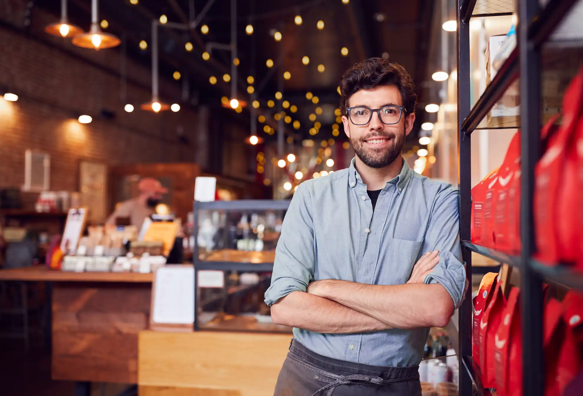 man standing in a shop